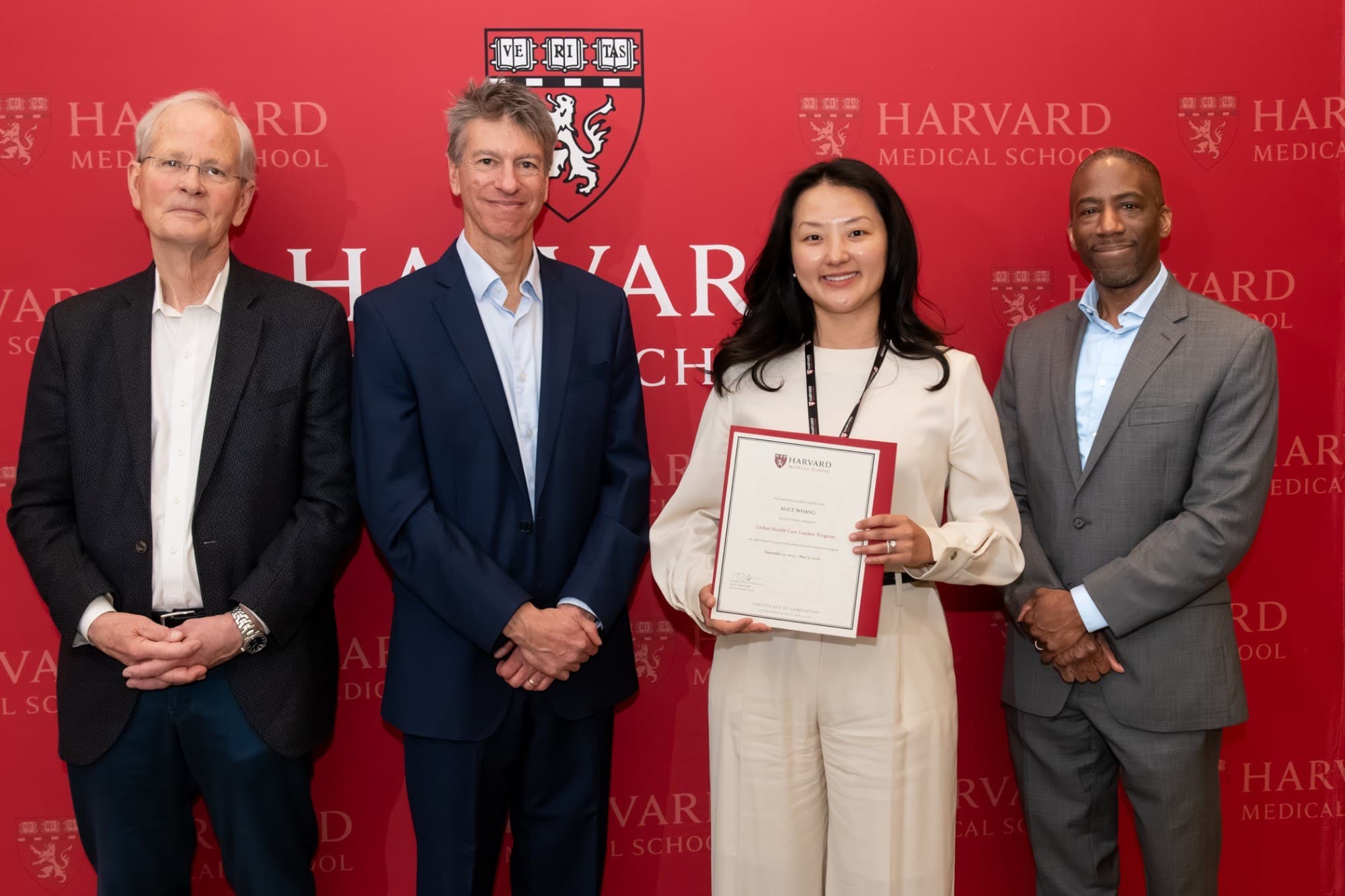 View photograph 1 of 7: Dr Alice Whang receiving her Global Health Care Leaders Program certificate at Harvard Medical School